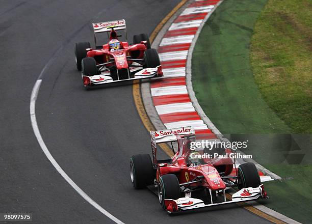 Felipe Massa of Brazil and Ferrari leads from team mate Fernando Alonso of Spain and Ferrari during the Australian Formula One Grand Prix at the...