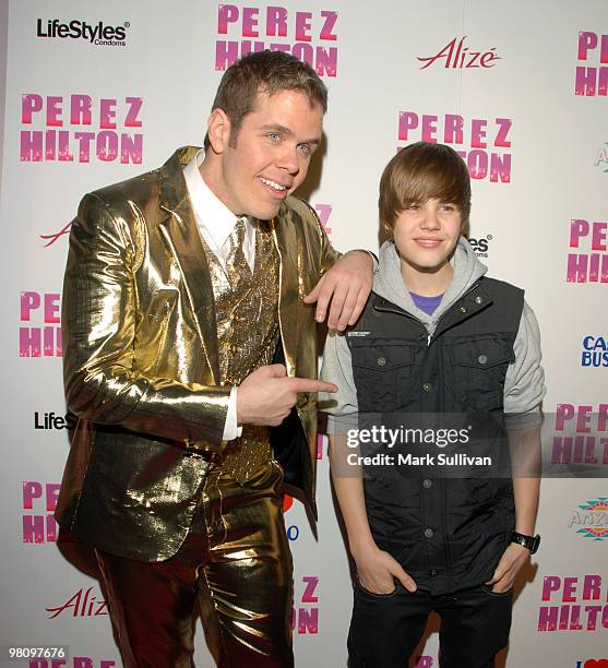 Perez Hilton and singer Justin Bieber arrive at Perez Hilton's CARN-EVIL Theatrical Freak & Funk 32nd birthday party on March 27, 2010 in Los...