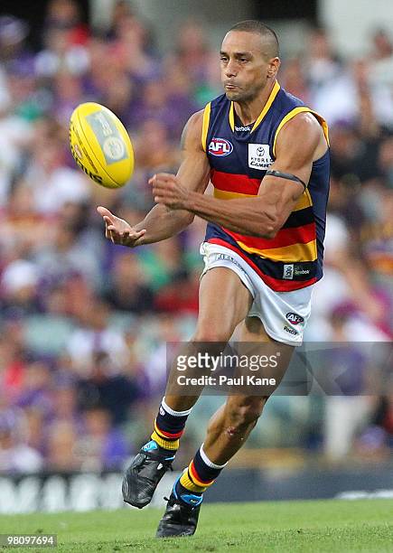 Andrew McLeod of the Crows handballs during the round one AFL match between the Fremantle Dockers and the Adelaide Crows at Subiaco Oval on March 28,...