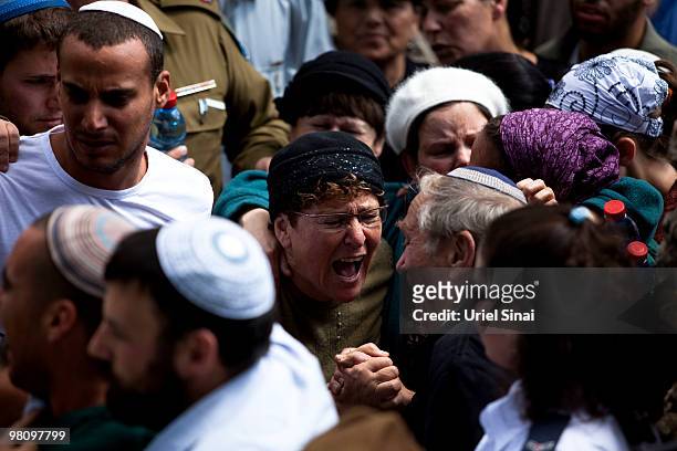 Mother of Major Eliraz Peretz mourns her son during his funeral, at the military cemetery on Mt. Herzl in Jerusalem. On March 28, 2010 in Jerusalem,...