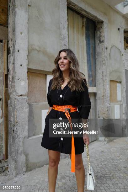 Janina Pfau wearing Off White belt, Zara dress, Chanel bag, Chloe shoes, Dior and Chloe jewelry on June 18, 2018 in Lisbon, Portugal. .