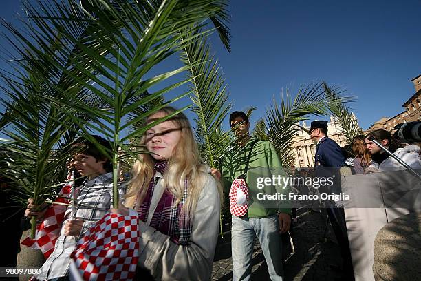 Children attend Palm Sunday Mass on March 28, 2010 in Vatican City, Vatican. The Pope is now facing pressure over abuse allegations which involved...
