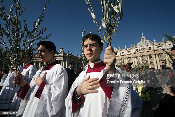 Priests attend Palm Sunday Mass on March 28, 2010 in Vatican City, Vatican. The Pope is now facing pressure over abuse allegations which involved the...