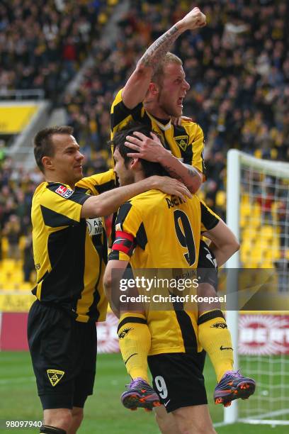 Daniel Adlung of Aachen celebrates the second goal with Szilard Nemeth of Aachen and Benjamin Auer of Aachen during the Second Bundesliga match...