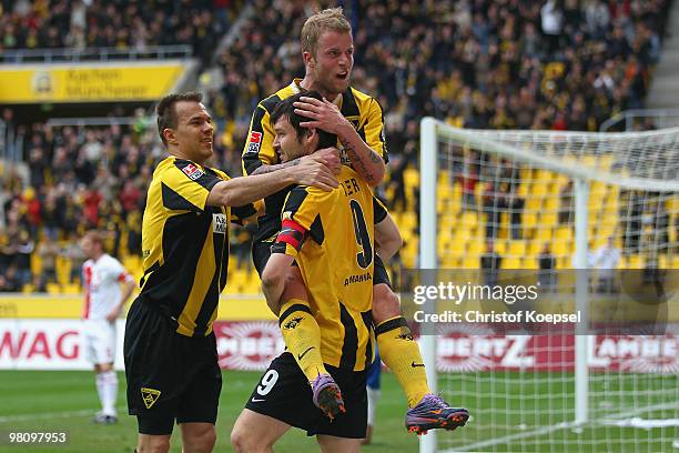 Daniel Adlung of Aachen celebrates the second goal with Szilard Nemeth of Aachen and Benjamin Auer of Aachen during the Second Bundesliga match...