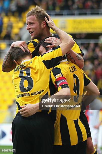 Daniel Adlung of Aachen celebrates the second goal with Szilard Nemeth of Aachen and Benjamin Auer during the Second Bundesliga match between...