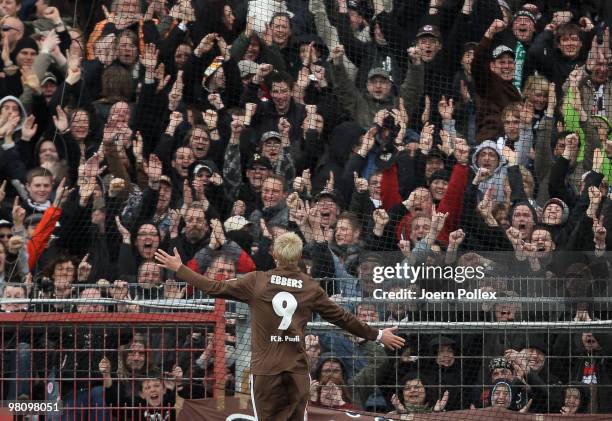 Marius Ebbers of St. Pauli celebrates with his team mates after scoring his team's first goal during the Second Bundesliga match between FC St. Pauli...