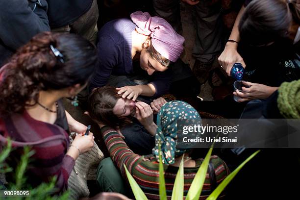 Relative of Major Eliraz Peretz mourns during his funeral at the military cemetery on Mt. Herzl in Jerusalem. On March 28, 2010 in Jerusalem, Israel....