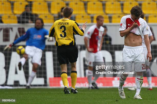 Daniel Baier of Augsburg looks dejected after the third goal of Aachen during the Second Bundesliga match between Alemannia Aachen and FC Augsburg at...