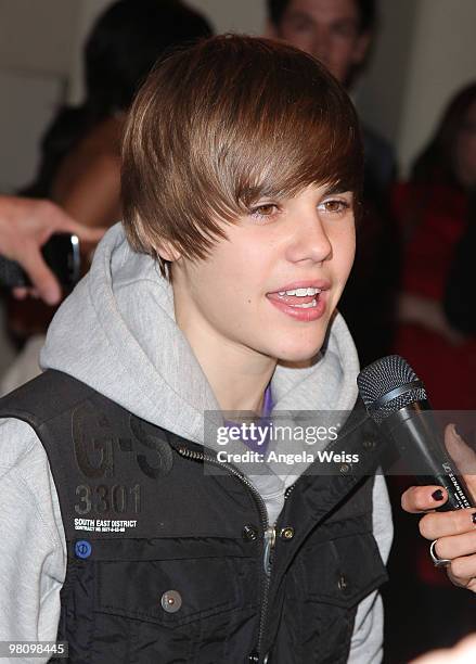 Singer Justin Bieber attends Perez Hilton's 'Carn-Evil' 32nd birthday party at Paramount Studios on March 27, 2010 in Los Angeles, California.