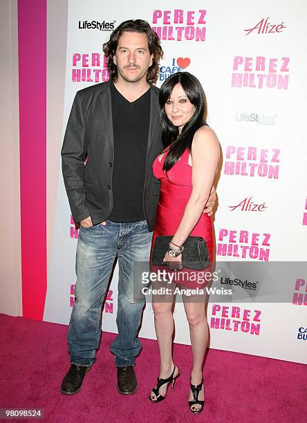 Photographer Kurt Iswarienko and actress Shannon Doherty attend Perez Hilton's 'Carn-Evil' 32nd birthday party at Paramount Studios on March 27, 2010...