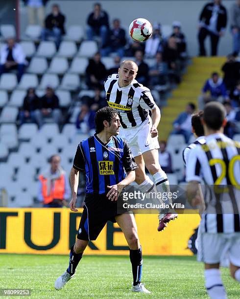 Fabio Cannavaro of Juventus FC competes for the ball with Nicola Amoruso of Atalanta BC during the Serie A match between Juventus FC and Atalanta BC...