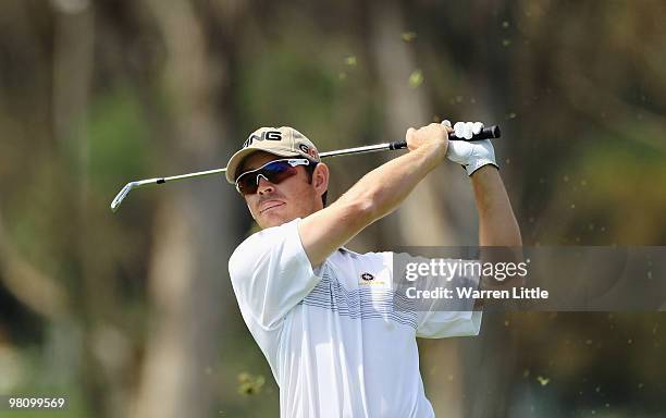 Louis Oosthuizen of South Africa plays his second shot into the third green during the fourth round of the Open de Andalucia 2010 at Parador de...