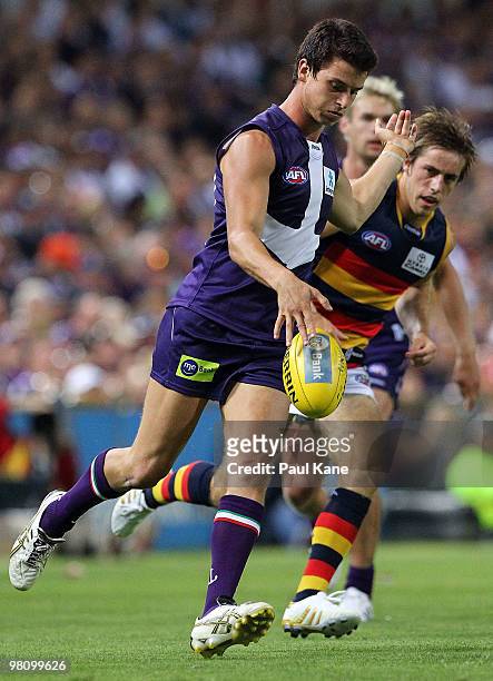 Alex Silvagni of the Dockers kicks the ball during the round one AFL match between the Fremantle Dockers and the Adelaide Crows at Subiaco Oval on...