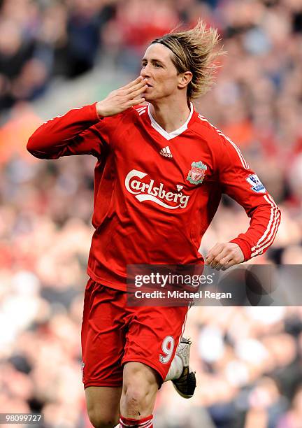 Fernando Torres of Liverpool celebrates scoring the opening goal during the Barclays Premier League match between Liverpool and Sunderland at Anfield...