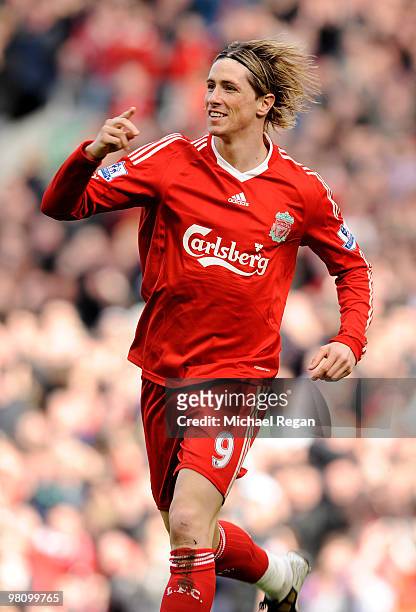 Fernando Torres of Liverpool celebrates scoring the opening goal during the Barclays Premier League match between Liverpool and Sunderland at Anfield...