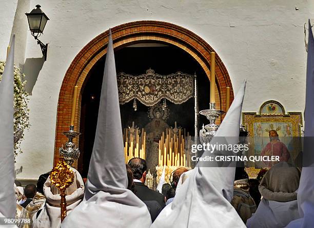 The Virgin in the La Paz brotherhood procession is seen during the Holy Week in Sevilla on March 28, 2010. Palm Sunday is the start of the week...