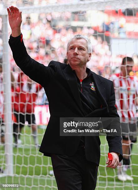 Southampton manager Alan Pardew celebrates after winning the Johnstone's Paint trophy Final between Southampton v Carlisle United at Wembley Stadium...
