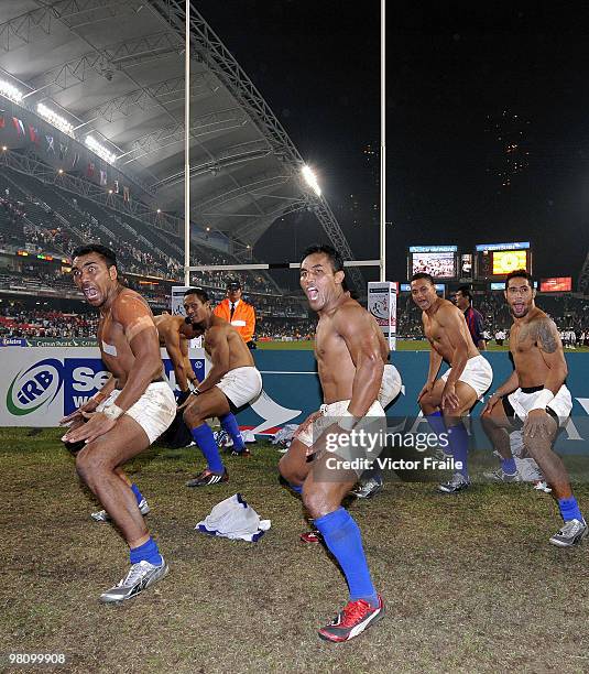Samoa players celebrate after beating New Zealand in the final match on day three of the IRB Hong Kong Sevens on March 28, 2010 in Hong Kong.