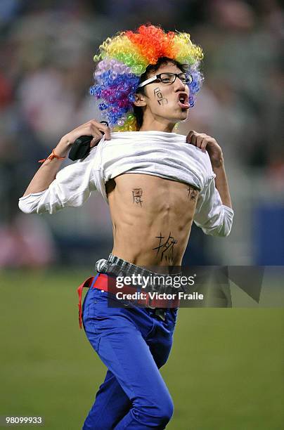 Streaker runs onto the field at the end of the final match between Samoa and New Zealand on day three of the IRB Hong Kong Sevens on March 28, 2010...