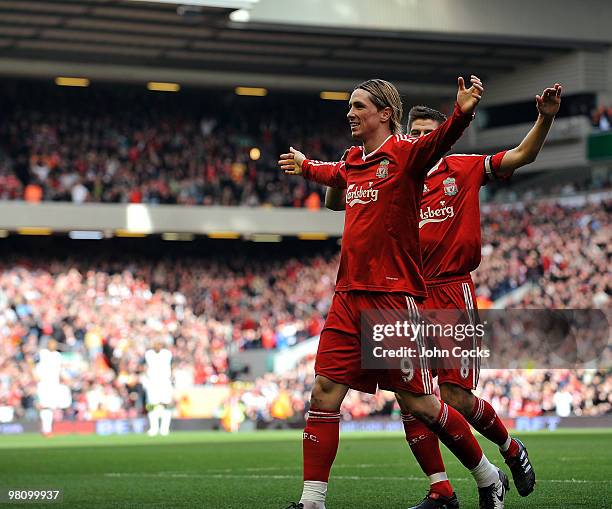 Fernando Torres of Liverpool celebrates after scoring a goal during the Barclays Premier League match between Liverpool and Sunderland at Anfield on...