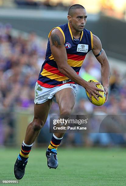 Andrew McLeod of the Crows runs with the ball during the round one AFL match between the Fremantle Dockers and the Adelaide Crows at Subiaco Oval on...