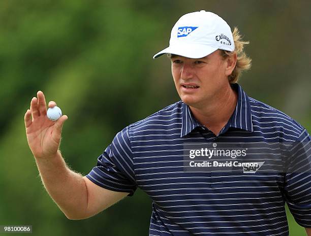 Ernie Els of South Africa waves to the gallery after a birdie on the first hole during the final round of the Arnold Palmer Invitational presented by...