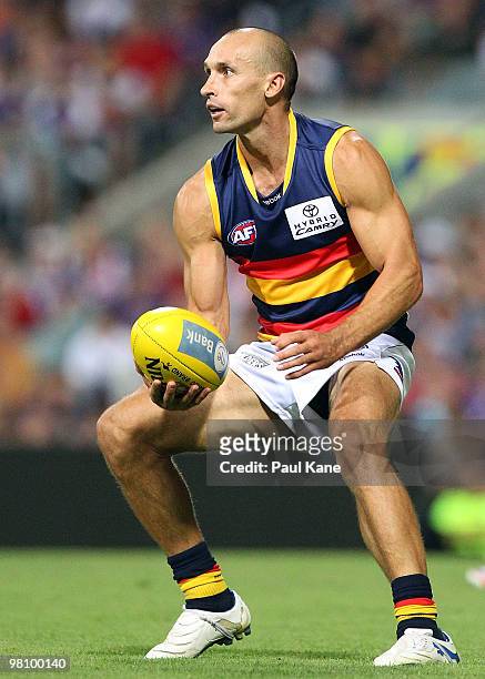 Tyson Edwards of the Crows looks for a pass during the round one AFL match between the Fremantle Dockers and the Adelaide Crows at Subiaco Oval on...