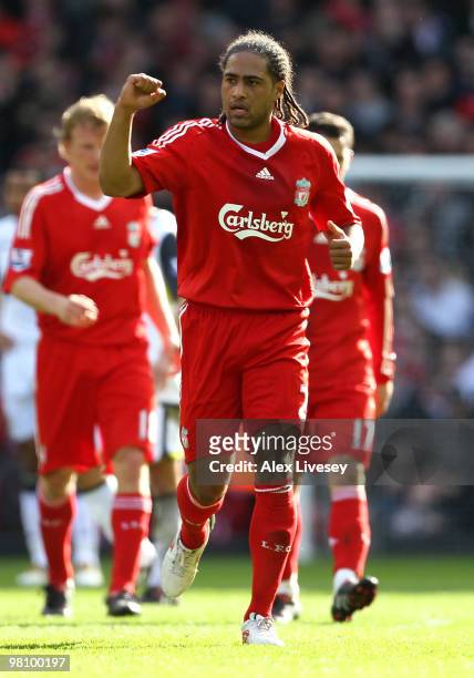 Glen Johnson of Liverpool celebrates scoring his team's second goal during the Barclays Premier League match between Liverpool and Sunderland at...
