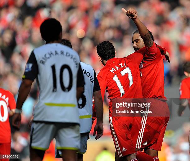 Glen Johnson of Liverpool celebrates after scoring the second goal during the Barclays Premier League match between Liverpool and Sunderland at...