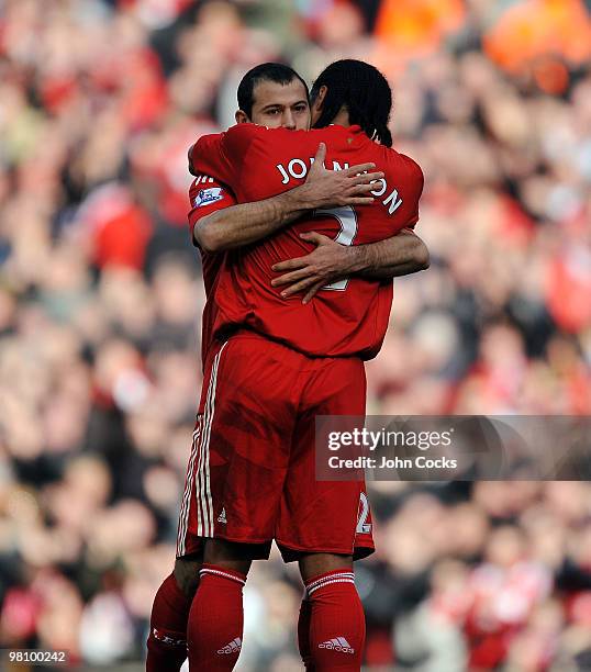 Glen Johnson of Liverpool celebrates after scoring the second goal during the Barclays Premier League match between Liverpool and Sunderland at...