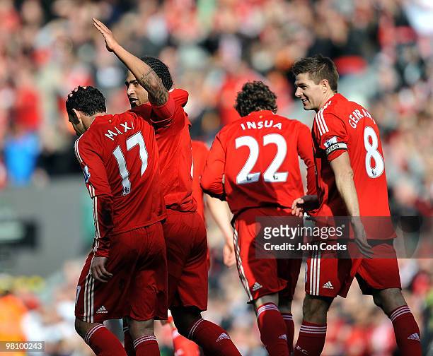 Glen Johnson of Liverpool celebrates after scoring the second goal during the Barclays Premier League match between Liverpool and Sunderland at...