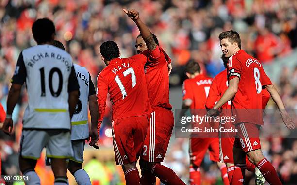 Glen Johnson of Liverpool celebrates after scoring the second goal during the Barclays Premier League match between Liverpool and Sunderland at...