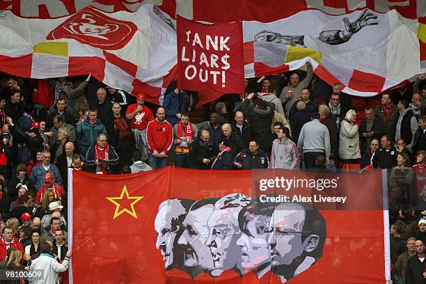 Liverpool fans display banners on the Kop prior to the Barclays Premier League match between Liverpool and Sunderland at Anfield on March 28, 2010 in...