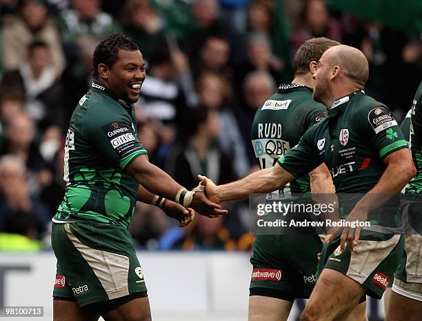 Steffon Armitage of London Irish is congratulated by his team-mate Paul Hodgson after scoring a try during the Guinness Premiership match between...