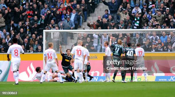 Roel Brouwers of Gladbach celebrates scoring his team's first goal during the Bundesliga match between Borussia Moenchengladbach and Hamburger SV at...