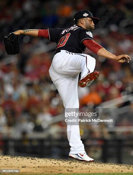 Kelvin Herrera of the Washington Nationals pitches in the eighth inning against the Baltimore Orioles at Nationals Park on June 19, 2018 in...