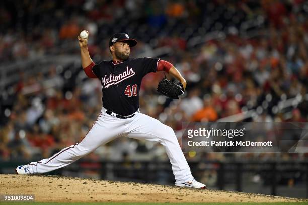 Kelvin Herrera of the Washington Nationals pitches in the eighth inning against the Baltimore Orioles at Nationals Park on June 19, 2018 in...