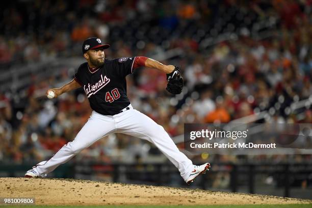 Kelvin Herrera of the Washington Nationals pitches in the eighth inning against the Baltimore Orioles at Nationals Park on June 19, 2018 in...