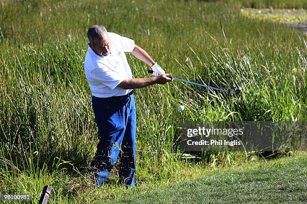 Sam Torrance of Scotland in action during the final round of the Berenberg Bank Masters played over the Links at Fancourt on March 28, 2010 in...