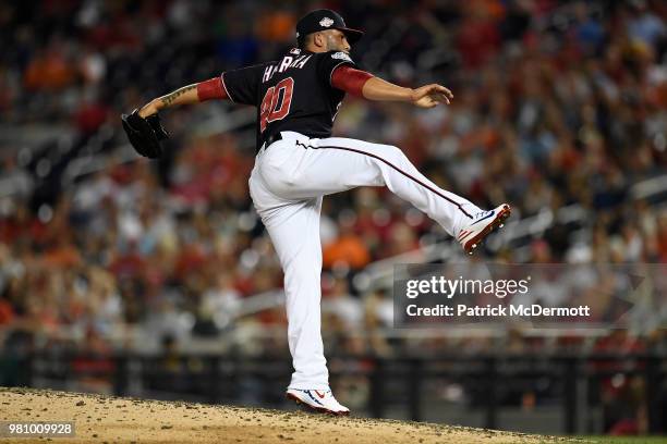 Kelvin Herrera of the Washington Nationals pitches in the eighth inning against the Baltimore Orioles at Nationals Park on June 19, 2018 in...