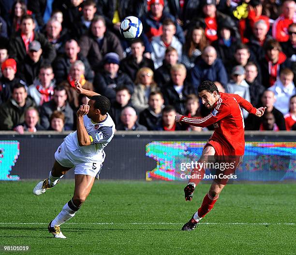 Maxi Rodriguez of Liverpool kicks the ball high during the Barclays Premier League match between Liverpool and Sunderland at Anfield on March 28,...