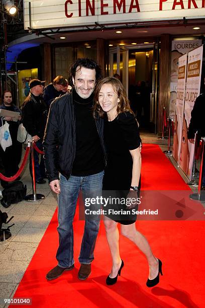 Actress Sylvie Testud and actor Bruno Todeschini attend the premiere of 'Lourdes' at cinema Paris on March 28, 2010 in Berlin, Germany.
