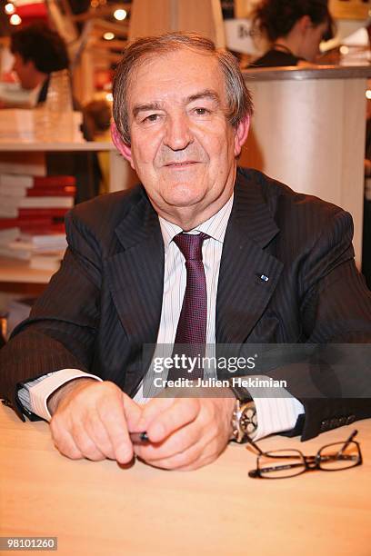 Jean-Louis Bruguiere signs copies of his book at the 30th salon du livre at Porte de Versailles on March 28, 2010 in Paris, France.