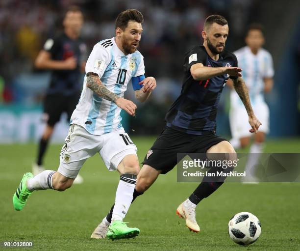 Lionel Messi of Argentina vies with Marcelo Brozovic of Croatia during the 2018 FIFA World Cup Russia group D match between Argentina and Croatia at...
