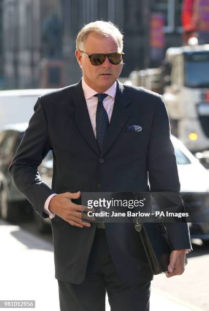 Former TV presenter John Leslie arrives at Edinburgh Sheriff Court, where he is charged with sexually assaulting a woman by putting his hand down her...
