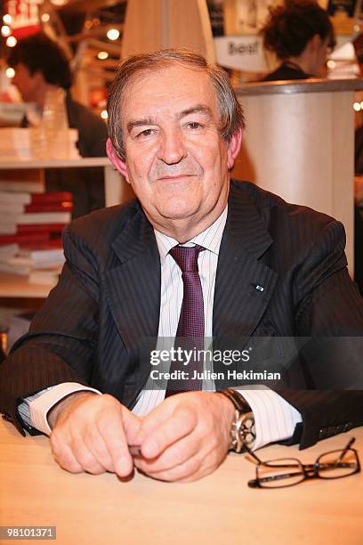 Jean-Louis Bruguiere signs copies of his book at the 30th salon du livre at Porte de Versailles on March 28, 2010 in Paris, France.