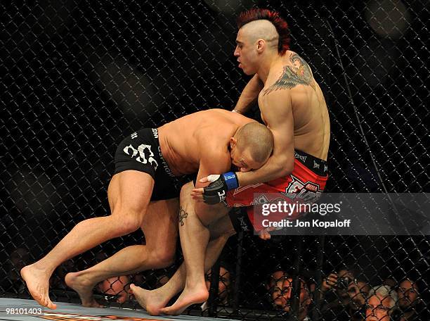 Fighter Georges St-Pierre battles Dan Hardy during their Welterweight title bout at UFC 111 at the Prudential Center on March 27, 2010 in Newark, New...