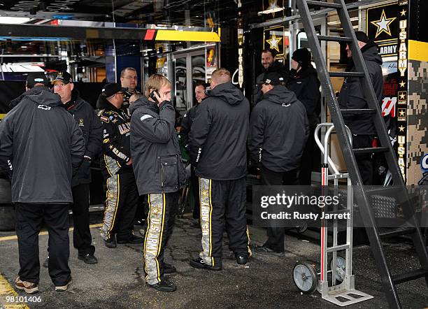 Crew chief Tony Gibson and crew members for the Haas Automation Chevrolet driven by Ryan Newman ,, stand by the hauler prior to the start of the...