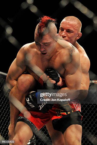 Fighter Georges St-Pierre battles Dan Hardy during their Welterweight title bout at UFC 111 at the Prudential Center on March 27, 2010 in Newark, New...